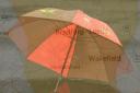 A photo of an umbrella with the yellow weather warning catchment areas overlayed