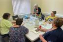 TRANSFORMATION: Garage Art Group at its new home in Wallace House Community Centre