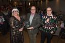 Worcestershire Ambassadors’ Membership Executive  Tracey Hopkins (left) and Director Vince Hopkins (right) present the retiring Phil Dutton (centre) with a gift from the Ambassadors’ Board