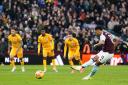 Aston Villa's Ollie Watkins scores their side's first goal of the game