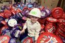 Teddy Michaelides with some of his huge chocolate tub collection