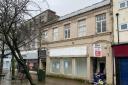 Plans to turn a former Dorothy Perkins store into a 12-room HMO have been approved