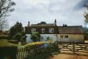 Pictures of Hiawatha, in Swanmore, a Hampshire flint cottage. Planning permission is sought to knock it down and replace it with two modern houses.