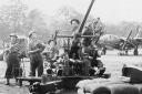 An anti-aircraft gun crew at Holmsley South airfield.