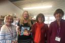 Vicky Phillips with ‘Dottie’s Tale Tales’ with Library volunteers: Ann Richards, Debbie Evenhand and Alison Parsons.