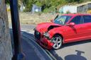 A red Audi has crashed into a wall in Ventnor