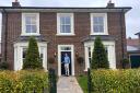 One of teh first homes built by Thakeham at Welborne. Tristan Robinson from the company on the doorstep.