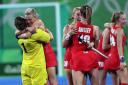 Alex Danson celebrates with Team GB teammates after the final whistle