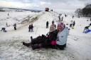 Olivia Halford and Catherine Perry enjoy tobogganing at Badbury Rings, February 2009