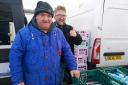 Charity chairman Alan Dunne (left) and one of the helpers at a previous Helston event