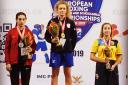 Amber Moss-Birch, centre, on top of the podium in Georgia