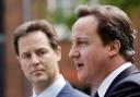 Archive photo of former Prime Minister David Cameron, right, and his then deputy Nick Clegg holding their first joint press conference in 2010. PA