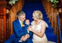 Leo and Caroline Poulter with daughter Neve on their wedding day