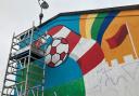 A colourful mural showcasing Southampton is being painted at the city's main railway station