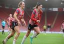 Megan Collett celebrates giving Saints FC Women the lead against Watford.