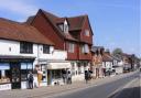 Updated plans to turn part of a former bank into flats have been approved