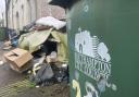 The council leader says the authority has 'fallen short' on its bin collection duties