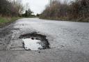 It is not advised to begin filling in potholes yourself