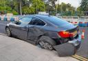 A grey BMW was badly damaged in the crash