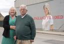 Left to right: Anne and Graham Hunter at the mural of their daughter Claire