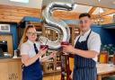 Deputy Manager Georgia Chilcott and head chef Coner Hurford are celebrating the fifth birthday of The Four Horseshoes