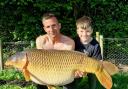 Paul and Frank Johnson with the 40lb carp fish in the New Forest