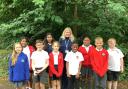 Headteacher Marcella Dobson with pupils from Hollybrook Junior School