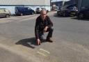 Mark Newland says double yellow lines outside his business will make the parking situation worse