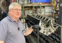 Senior engineer Ian Stanfield with the rear engine crankcase