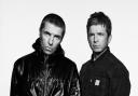 Liam Gallagher, left, and his brother Noel will be reunited for their first Oasis gig in Manchester for almost 16 years (Simon Emmett/Fear PR/PA)