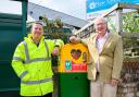 Richard Rastall, left, of ExxonMobil and Alan Alvey, chairman of Fawley Parish Council, with the new defibrillator at Calshot Road