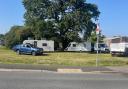 Travellers on a green space in Lordshill