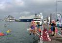 Brave swimmers took the plunge in open water at the Southampton International Boat Show for charity