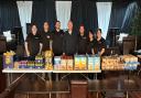 The Chapter Eight Foundation pictured at their October 2024 pantry. From left to right: Mike Smith, Aaron Hale, Louis Moody, Al Moody, Stuie Bridle, Cheryl Bridle, Becky Smith