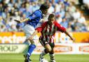 Southampton's Kevin Phillips (right) evades the challenge of Leicester's Muzzy Izzet during the FA Barclaycard Premiership match at the Walkers Stadium, Leicester, Saturday August 16, 2003. Leicester drew 2-2 with Southampton. PA Photo: David Davies.