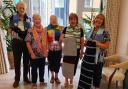 The 'Knit and Natter' club at Alston House Care Home, Leigh Road, produced a 45-metre section of the giant scarf