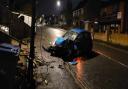 The aftermath of a car colliding with a telegraph pole on Woodmill Lane