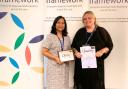 Carpathia Grange home manager Pooja Dhoot and deputy manager Jodie Farr collect the award