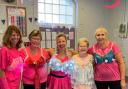 Members and staff donned pink outfits and bras for their gym sessions