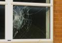 Stock image of a smashed window