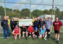 Cheque presentation to Hampshire and Isle of Wight Air Ambulance at a recent walking football session at Eastleigh’s Silverlake stadium.