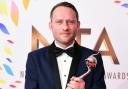 Coronation Street actor Peter Ash picking up his National Television Award