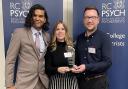 Professor Subodh Dave, College Dean presenting the award to Katy Bartolomeo, operational lead for Older People’s Mental Health and Marc Ashley-Mann, programme manager