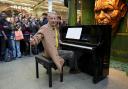 Jeff Goldblum gives a surprise piano performance to travellers at St Pancras International station in London (Lucy North/PA)