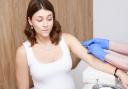 Pregnant women are being urged to get their vaccinations