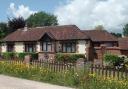 The bungalow is located in the New Forest village of Dibden