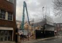 The demolition of the old Firehouse pub on Vincent's Walk is underway.