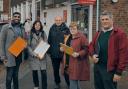 Councillors Nik Daas (left) and Sandra Gidley (second from right) petitioning outside Romsey PO