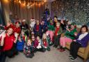 Father Christmas (David Woodley) with children from Sarisbury Infants School in the Ancasta Grove Grotto