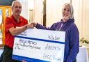 East Horton senior's captain, Peter Newman (left) presenting a cheque to CEO of Abby’s Heroes, Sally Randall (right)